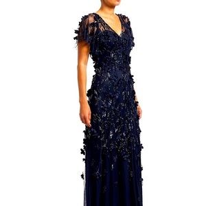 New with Tags—Theia Flutter Sleeve Floral Applique Gown in Midnight